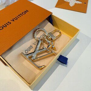 Louis Vuitton Gold - Tone LV Logo Keychain